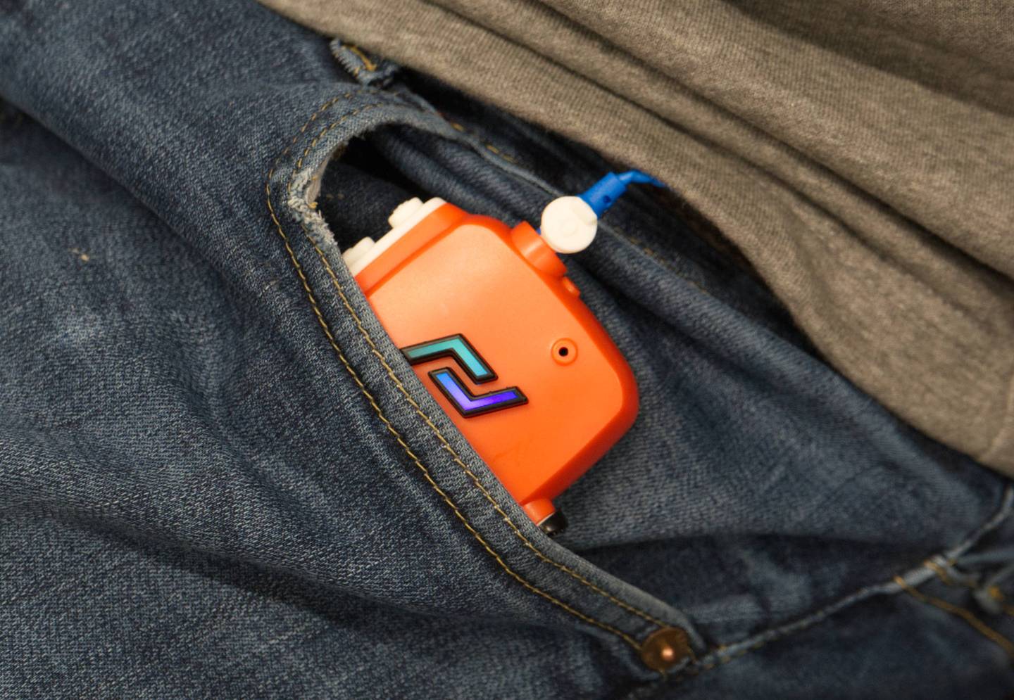 picoLink - picoTera communication & safety device in man's trouser pocket